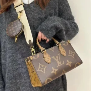 Louis Vuitton On the Go East West Handbag (With Box)