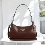 Coach Teri Leatherate Brown Sling Bag (With Box) - Accessories | Buy Online at Best Price