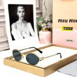 Miu Miu Round Gold Frame Black Women Sunglasses - Accessories | Buy Online at Best Price