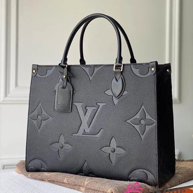 Louis Vuitton Black Embossed MM On The Go Bag