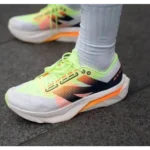 Trendy New Balance Fuelcell Rebel V4 White Neon Shoes For Men (SHUB744) - 7a first copy shoes | Buy Online at Best Price