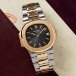 Patek Philippe Nautilus Mad Watch Quartz Movement Black Dial Silver And Gold Strap Dated Watch For Men’s-Best Men’s Collection PP-3573 - Buy Online | Brandfasion